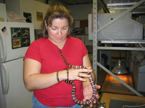 Amy holding a snake