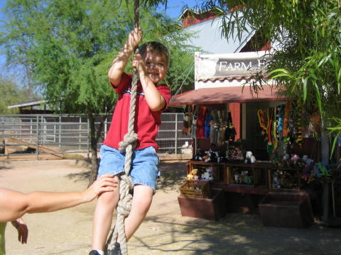 Conner on a rope swing